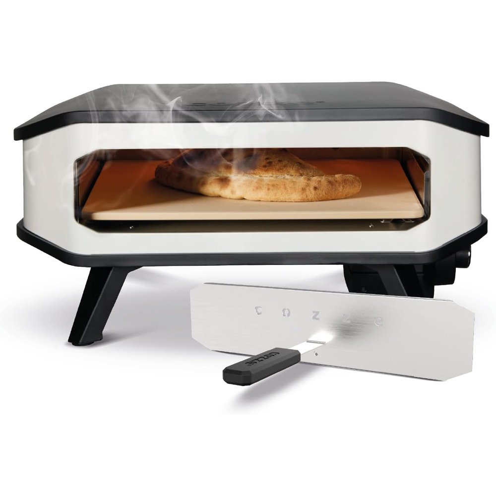Le Cozze 17 pouces avec une pizza en cuisson sur la pierre, et sa pelle en inox